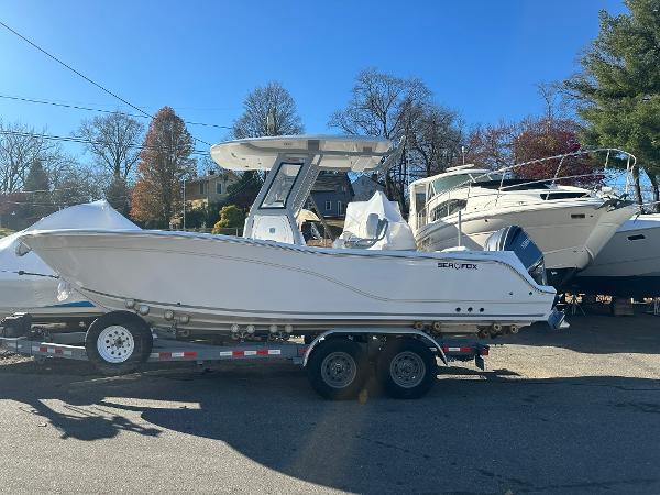 Sea Fox 248 Commander 2025 Sea Fox 248 Commander boat on trailer in outdoor setting.