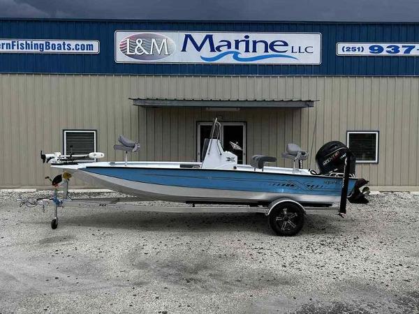 Xpress H20 BAY 2025 Xpress H20 BAY boat parked outside L&M Marine LLC building.