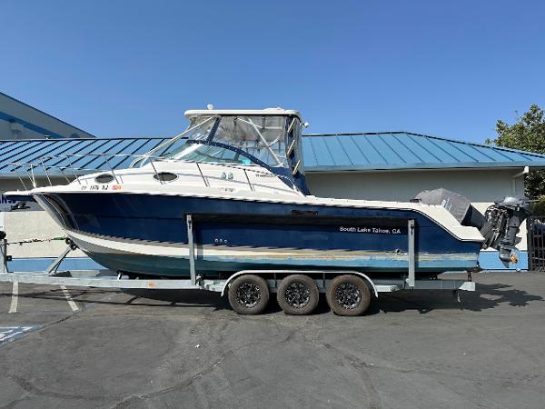 Wellcraft 290 Coastal 2006 Wellcraft 290 Coastal boat on trailer, South Lake Tahoe, CA, sunny day.