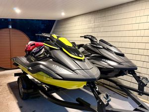 Yamaha WaveRunner FX Limited SVHO 2021 Yamaha WaveRunner FX Limited SVHO jet skis on a trailer in a garage.