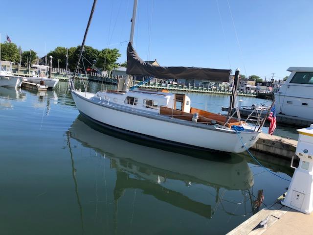 Contest 30 Mark I 1969 Contest 30 Mark I sailboat docked in a marina on a sunny day.