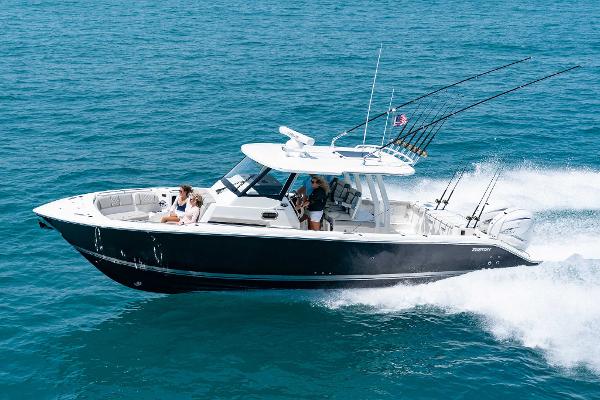 Pursuit S 358 Sport 2025 Pursuit S 358 boat cruising on open water.