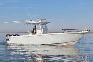 Contender 35 ST 2020 Contender 35ST boat on calm water, featuring sleek design and modern equipment.