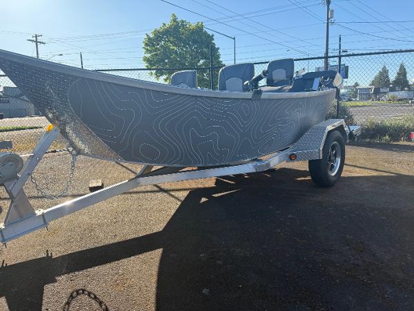 Custom Driftwood Boats Drifter 18.5 2025 Driftwood Boats Drifter 18.5 on trailer, featuring sleek design and modern detailing.