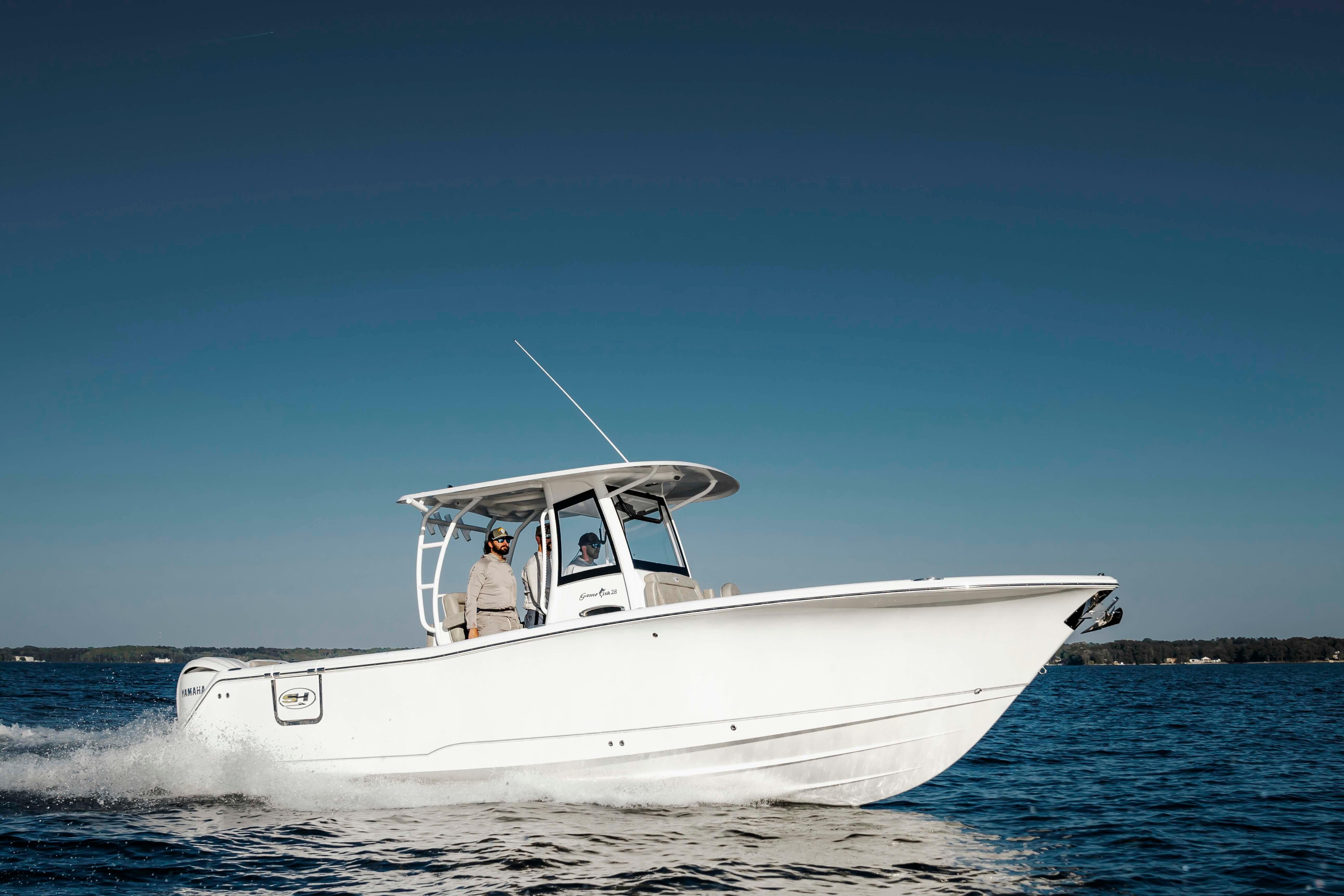 Sea Hunt Gamefish 28 Forward Seating 2026 Sea Hunt Gamefish 28 Forward Seating boat cruising on open water.