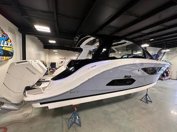 Sea Ray Sundancer 370 Outboard 2023 Sea Ray Sundancer 370 OB in showroom, sleek design with outboard motors.