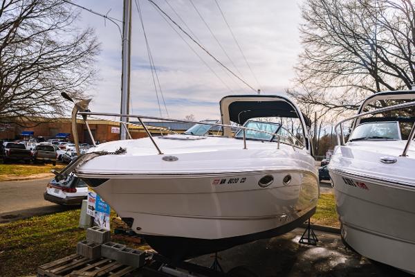 Chaparral 270 Signature 2018 Chaparral 270 Signature boat displayed outdoors on a sunny day.