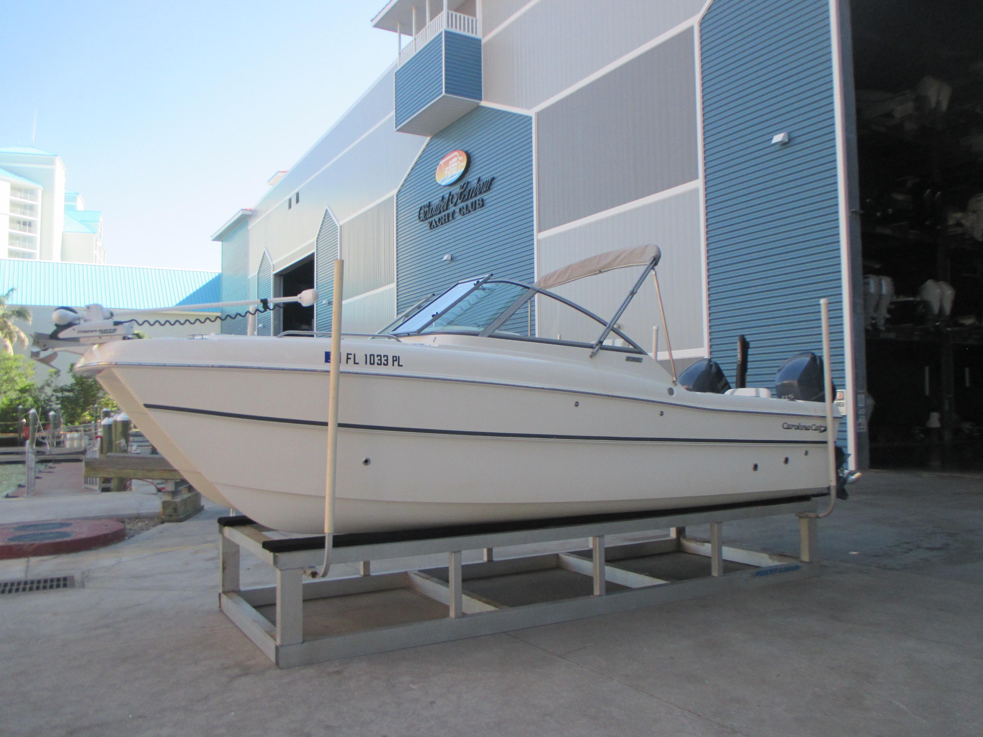 Carolina Cat 230 DC 2013 Carolina Cat 230 DC boat on display at a marina.