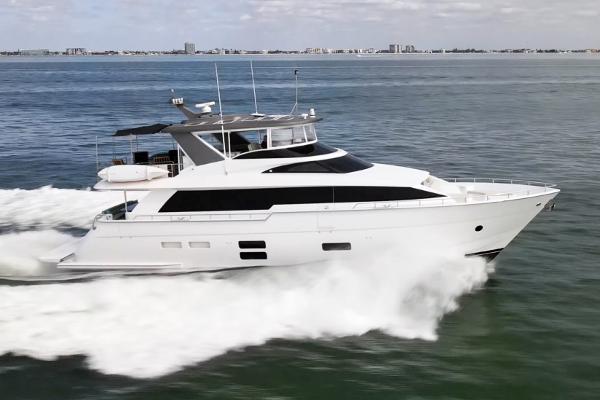 Hatteras M75 Panacera 2016 Hatteras M75 Panacera yacht cruising on open water.