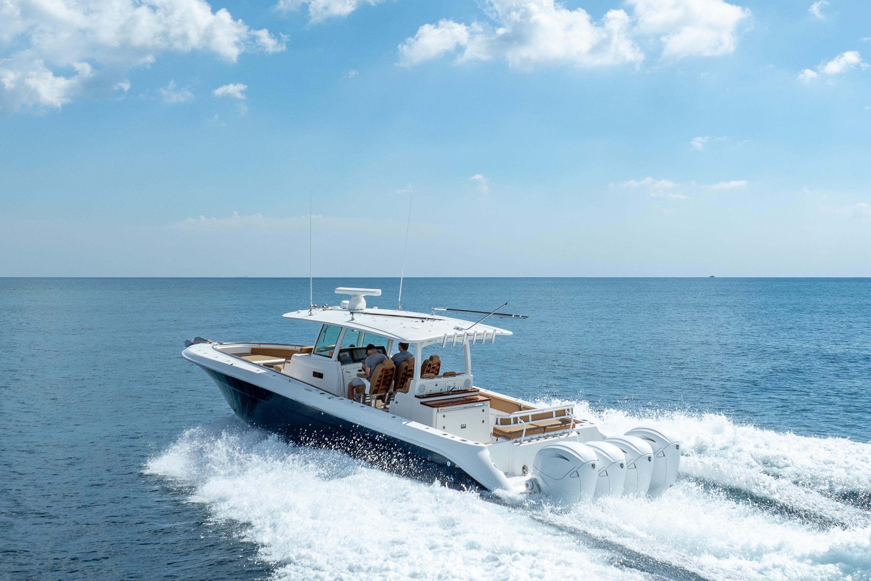 HCB 42 Lujo 2020 HCB 42 Lujo boat cruising on open sea under clear blue sky.