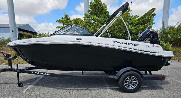 Tahoe 185 S 2025 Tahoe 185 S boat on trailer, black and white design, parked outdoors.
