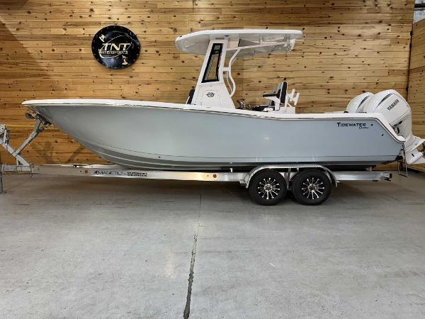 Tidewater 256 CC Adventure 2025 Tidewater 256 CC Adventure boat on trailer in showroom.