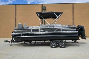 Ranger Reata 223FC 2025 Ranger Reata 223FC pontoon boat on trailer, featuring sleek design and canopy.