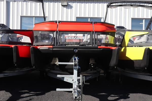 Sea-Doo Switch 16 - 130 2024 Sea-Doo Switch 16 - 130, vibrant red and yellow, parked on trailer.