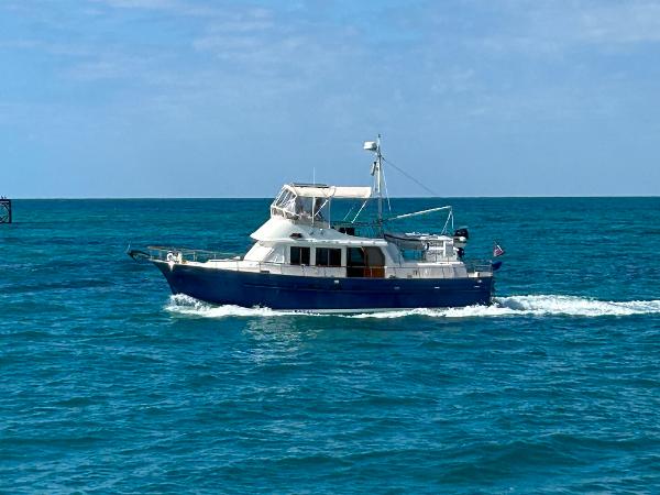 Albin Double Cabin 1987 Albin Double Cabin boat cruising on open blue sea.