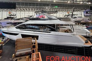 Azimut Fly 68 2024 Azimut Fly 68 yacht displayed indoors, available for auction.