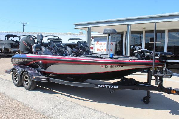 Nitro Z19 Pro 2022 Nitro Z19 Pro bass boat on trailer, parked outside dealership.