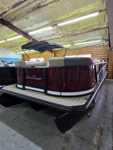 SunChaser Eclipse 23 SBX DH 2025 SunChaser Eclipse 23 SBX DH pontoon boat in indoor storage.