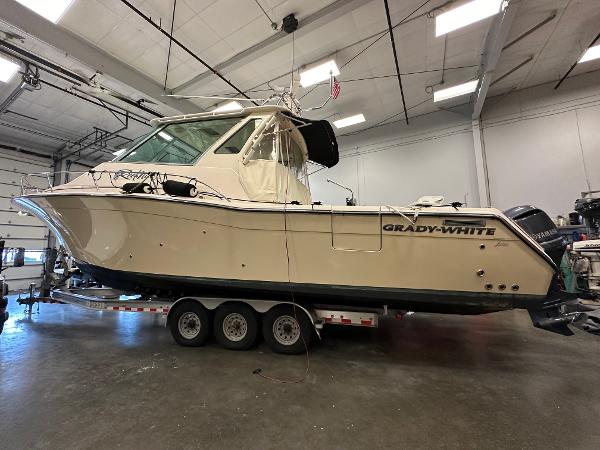 Grady-White Express 370 2016 Grady-White Express 370 boat on trailer in indoor storage facility.