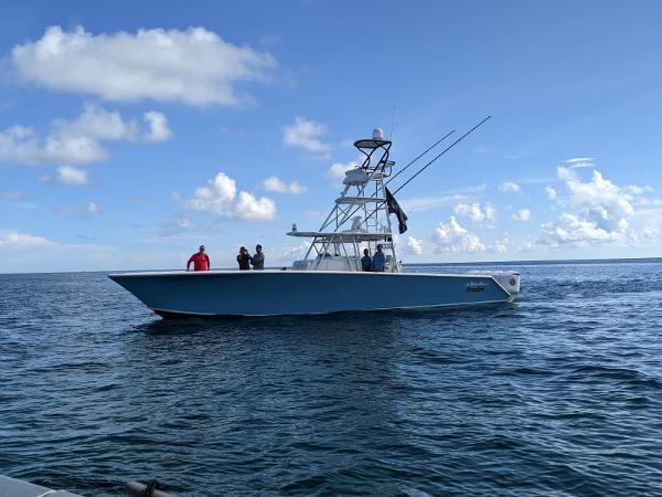 SeaHunter 45 Tournament 2014 SeaHunter 45 Tournament boat on open water under blue sky.