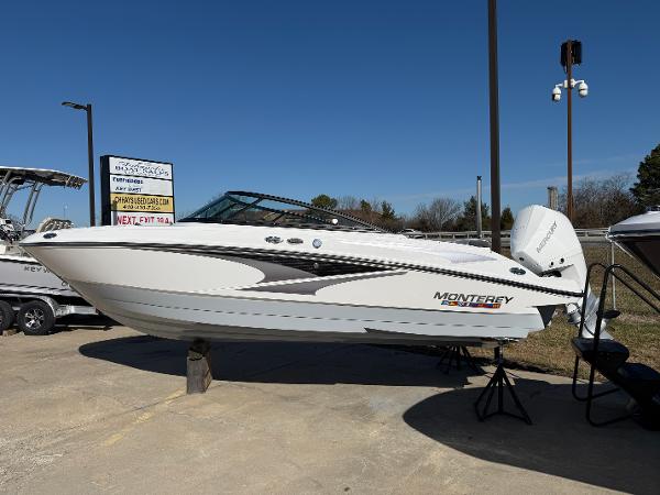 Monterey M-205 2024 Monterey M-205 boat displayed outdoors on a sunny day.