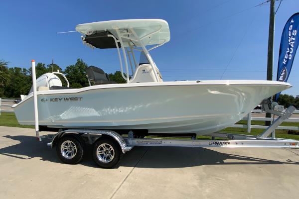 Key West 219 FS 2024 Key West 219 FS boat on a trailer, side view.