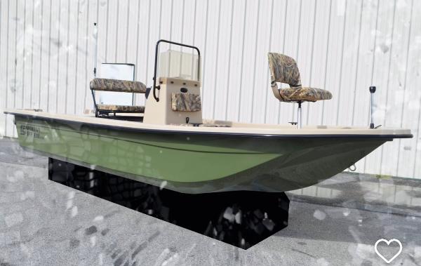 Carolina Skiff E18 JVX CC 2025 Carolina Skiff E18 JVX CC boat, green hull, camo seats, displayed outdoors.