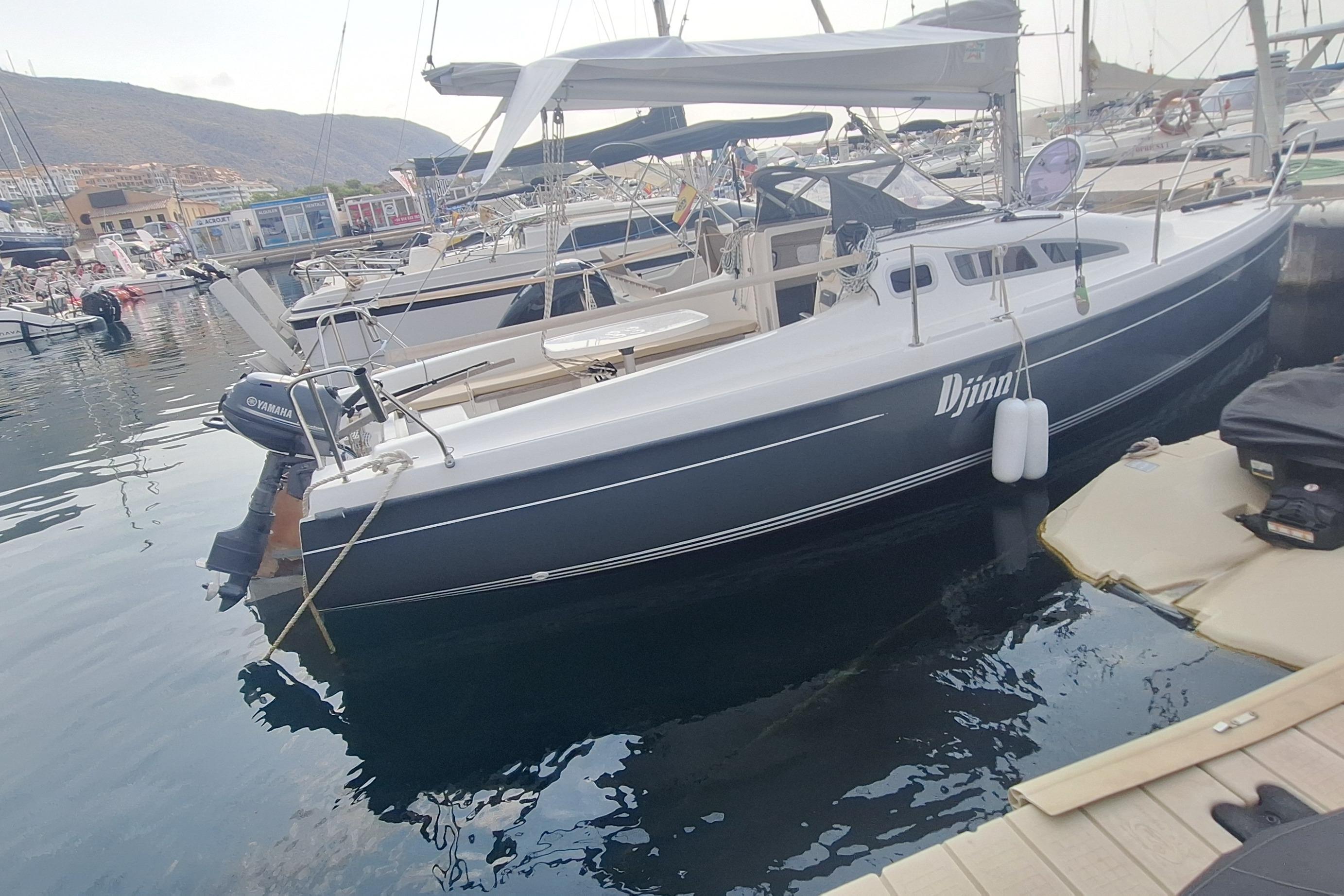B2 Marine DJINN 7 2016 B2 Marine DJINN 7 sailboat docked in a marina with Yamaha outboard motor.
