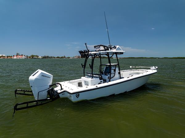 Barker Boatworks 26 2020 Barker Boatworks 26 on calm water, featuring a sleek design and powerful outboard motor.