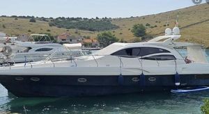 Innovazione e Progetti Alena 48 2007 Innovazione e Progetti Alena 48 yacht docked in a scenic harbor.