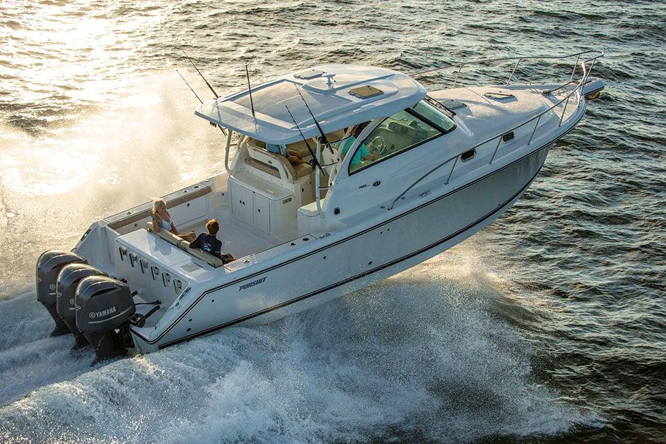 Pursuit OS 385 Offshore 2023 Pursuit OS 385 Offshore boat cruising on open water, powered by Yamaha engines.
