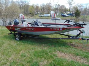 G3 Sportsman 17 2018 G3 Sportsman 17 fishing boat on trailer by a lake.