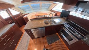 Horizon Vision Luxurious 2009 Horizon Vision yacht kitchen with granite countertops and modern appliances.