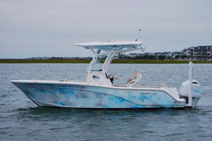 Sea Fox 226 Commander 2018 Sea Fox 226 Commander boat on water, featuring a sleek design and Yamaha engine.