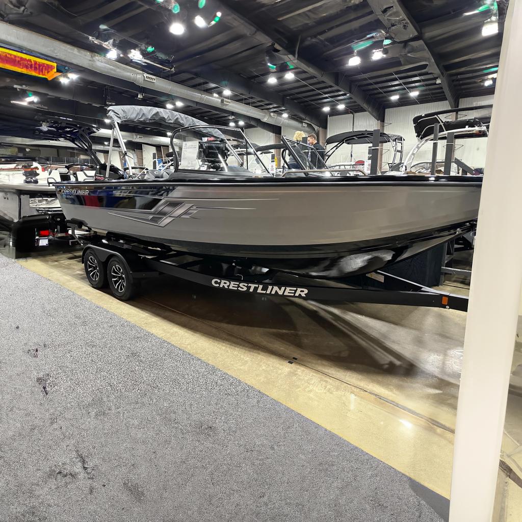 Crestliner 2250 Authority 2025 Crestliner 2250 Authority boat displayed indoors on a trailer.