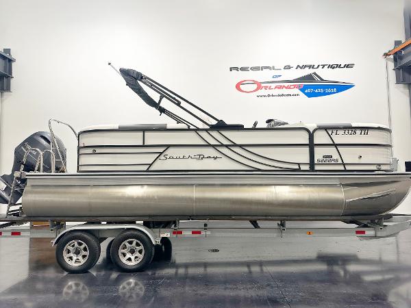 South Bay 222RS 2022 South Bay 222RS pontoon boat on trailer in showroom.