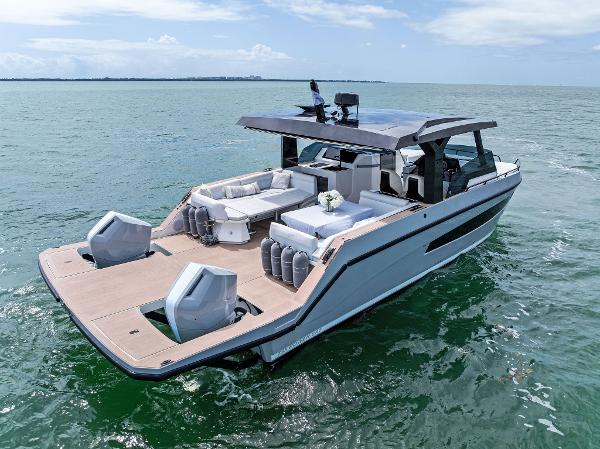 Tesoro T38 power cat 2024 Tesoro T38 Power Cat cruising on open water, showcasing sleek design and twin engines.