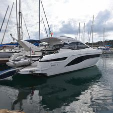 Bavaria SR41 2021 Bavaria SR41 yacht docked in marina, sleek design, overcast sky.