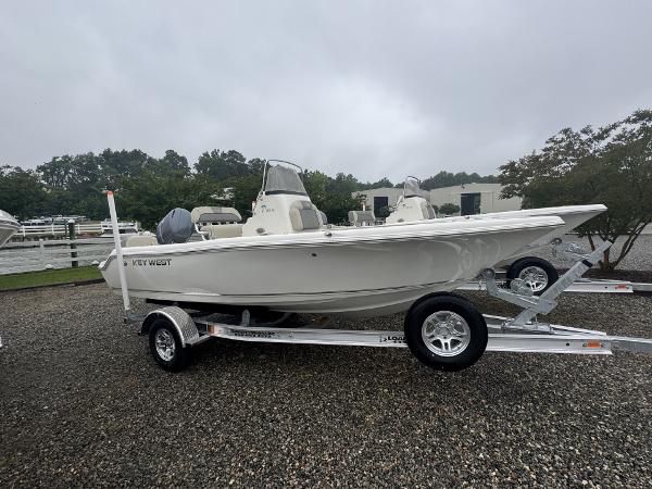 Key West 189 FS 2025 Key West 189 FS boat on trailer, parked outdoors on gravel.