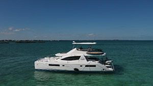 Leopard 51 Powercat 2016 Leopard 51 Powercat yacht cruising on clear blue waters.