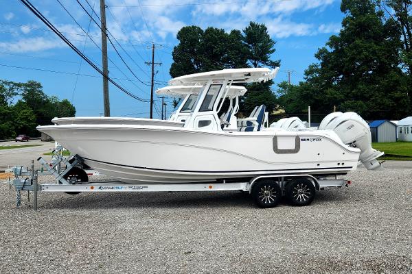 Sea Fox 268 Commander 2025 Sea Fox 268 Commander boat on a trailer, side view.