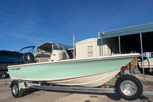Key West 188 Bay Reef 2026 Key West 188 Bay Reef boat on trailer under clear blue sky.