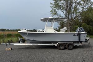 Parker 2300 Special Edition 2024 Parker 2300 Special Edition boat on trailer, parked outdoors near trees.