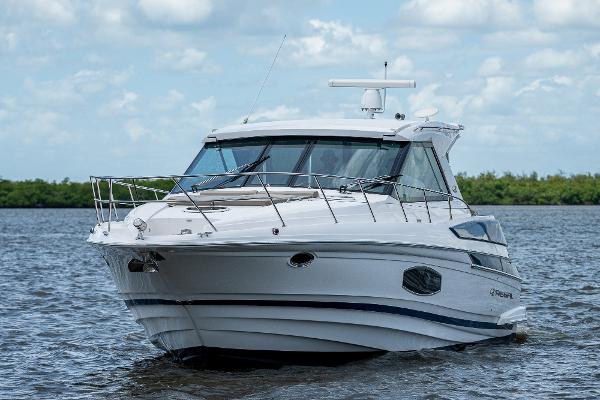 Regal 46 Sport Coupe 2015 Regal 46 Sport Coupe yacht cruising on open water.