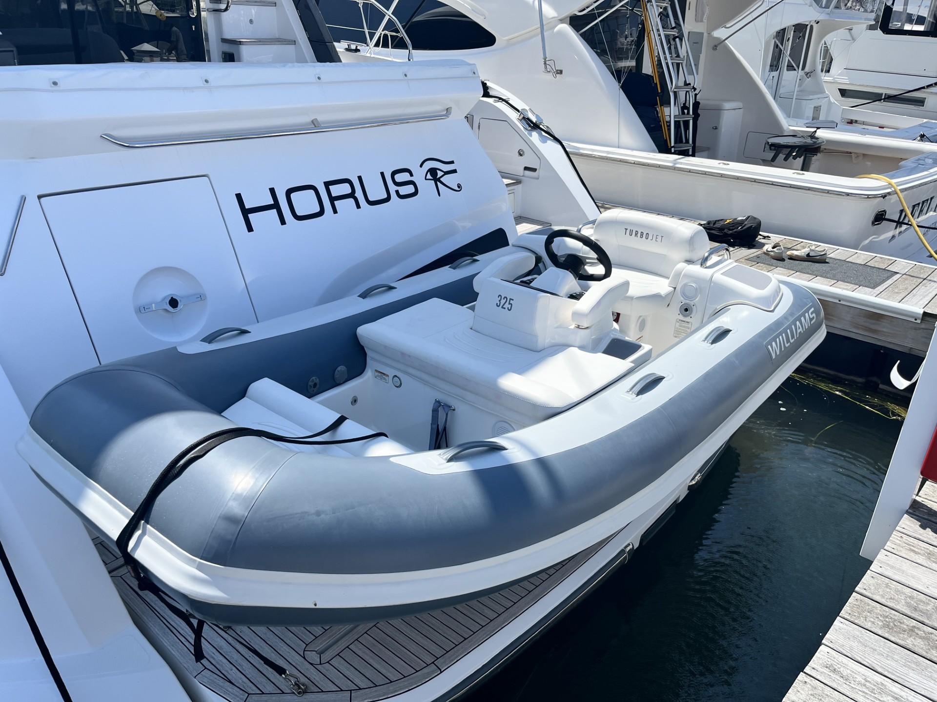 Williams Jet Tenders Turbojet 325 2021 Williams Jet Tenders Turbojet 325 docked beside a yacht.