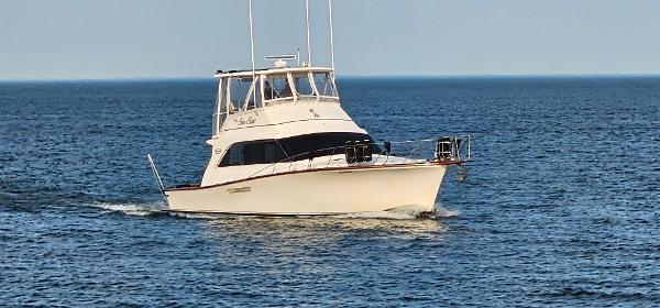 Ocean Yachts 48 Super Sport 1987 Ocean Yachts 48 Super Sport cruising on open water.