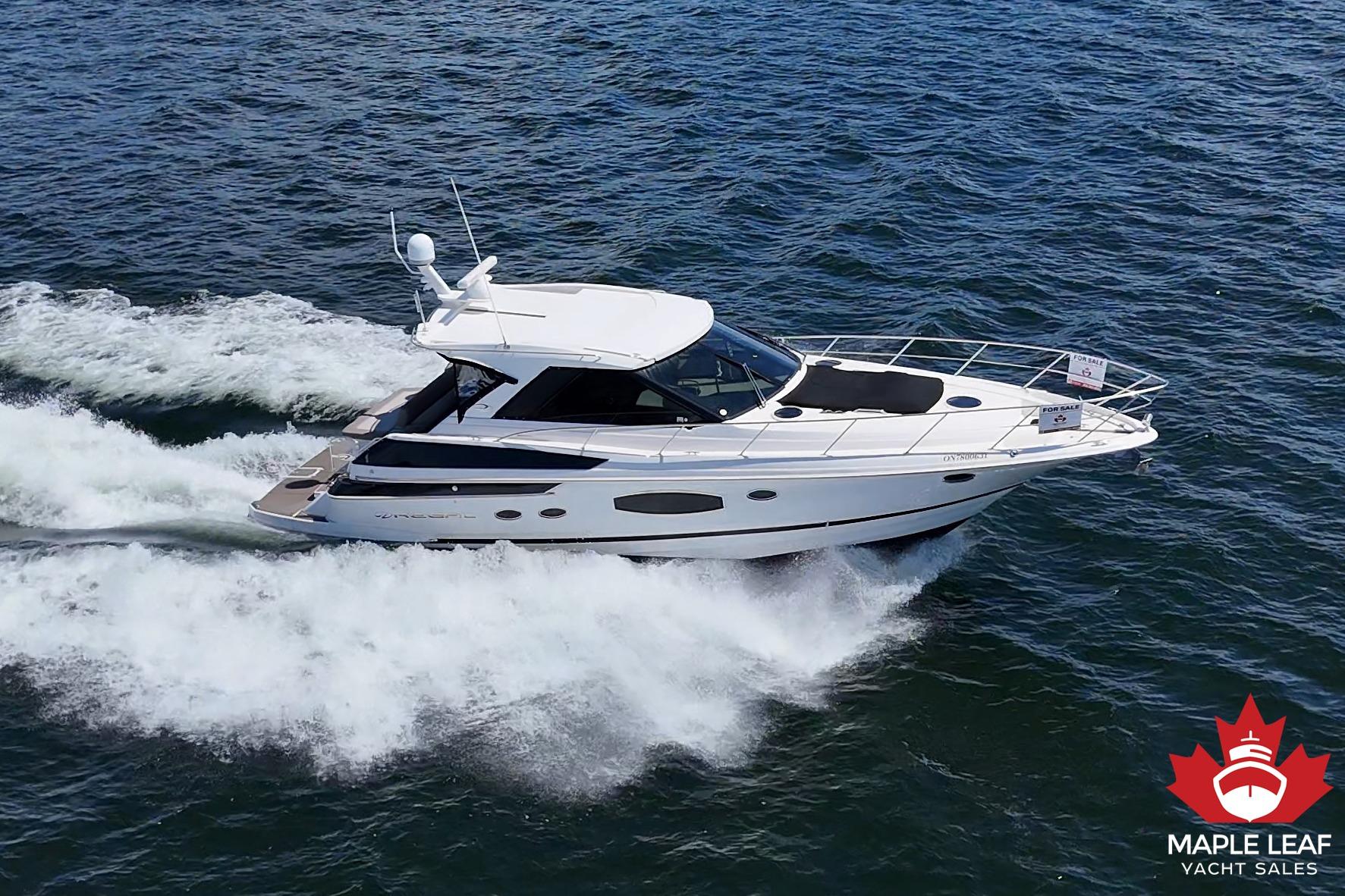 Regal 46 Sport Coupe 2015 Regal 46 Sport Coupe yacht cruising on open water, listed for sale by Maple Leaf Yacht Sales.