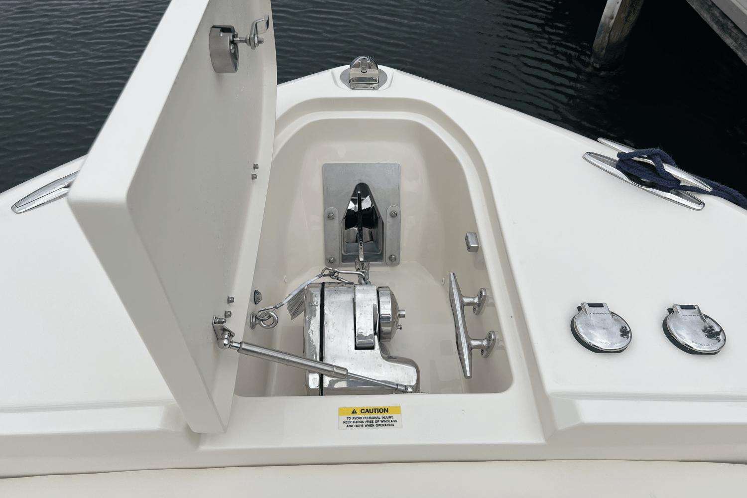 Grady-White Freedom 285 Anchor compartment of 2024 Grady-White Freedom 285 boat with open hatch.