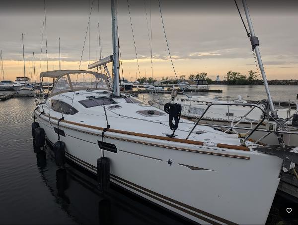 Jeanneau Sun Odyssey 42ds 2011 Jeanneau 42DS sailboat docked at marina during sunset.