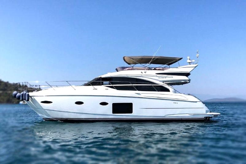 Princess 52 Luxury 2014 Princess 52 yacht cruising on calm blue waters.